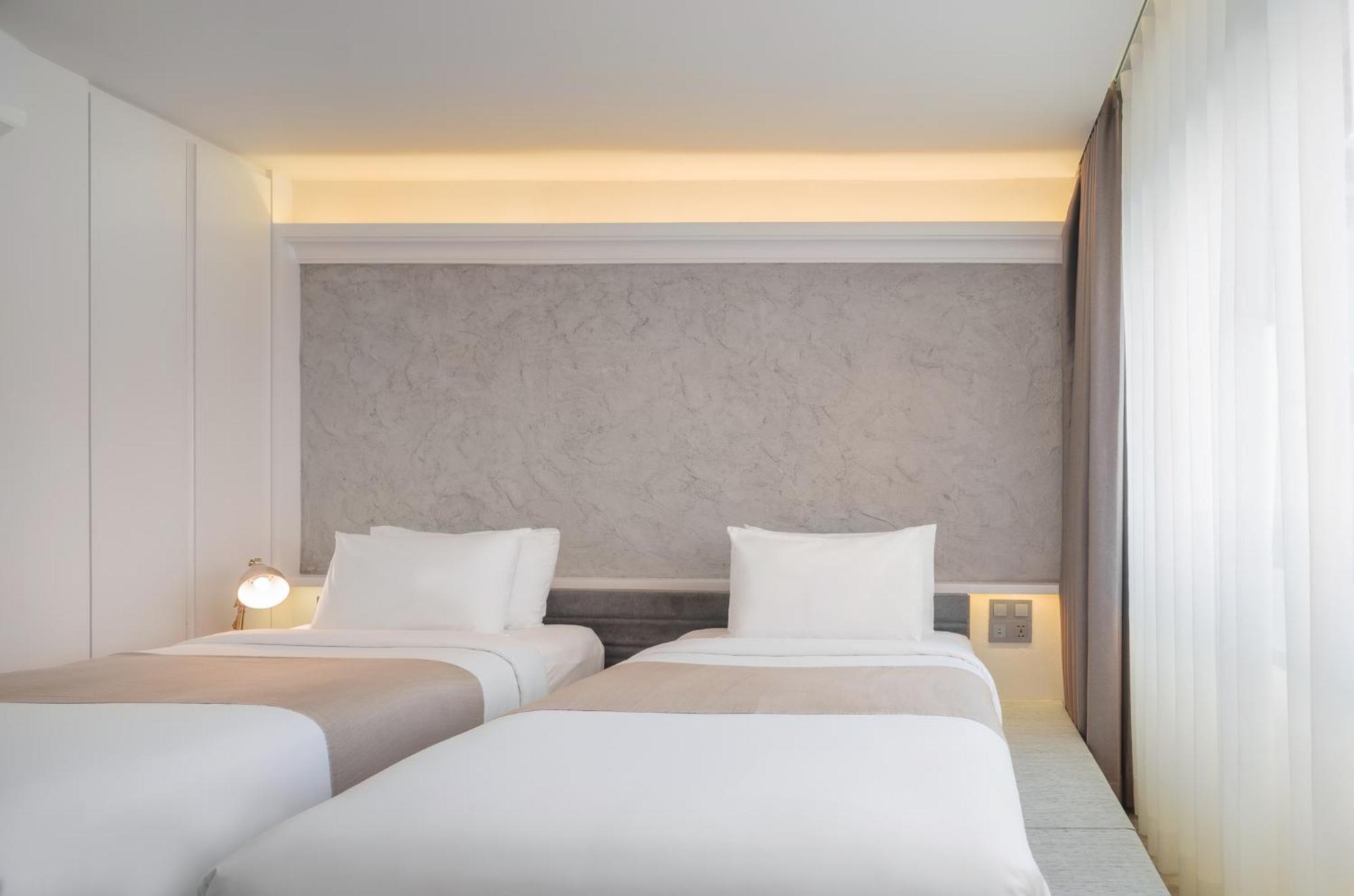 Nidhra Boutique Hotel Bangkok Sukhumvit Habitación foto