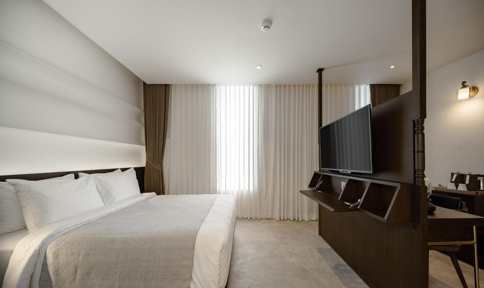 Nidhra Boutique Hotel Bangkok Sukhumvit Habitación foto